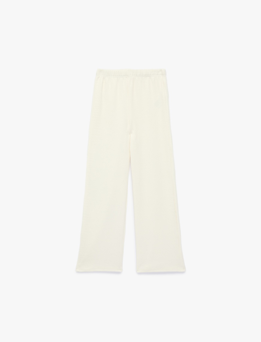 koton-ekru-pantolon-6skg40176ak-13166.jpg Koton Kız Çocuk Beli Lastikli Normal Paça Pamuklu Basic Pantolon 6Skg40176Ak - Görsel 1